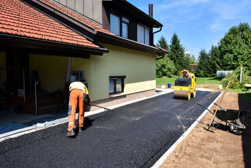 Local Home Driveway Paving pros at work